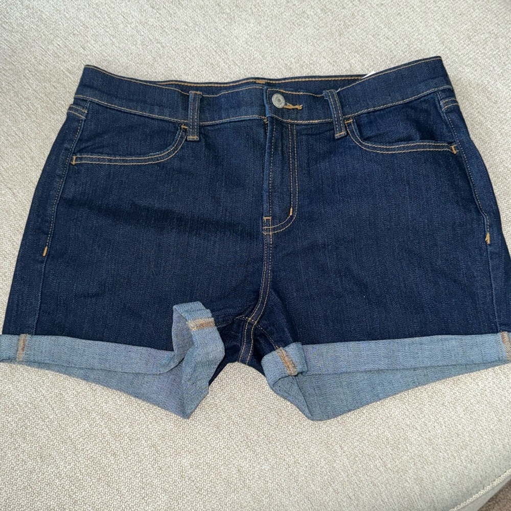 New without tags. Womens mid rise jean shorts. Dark blue. Size 6